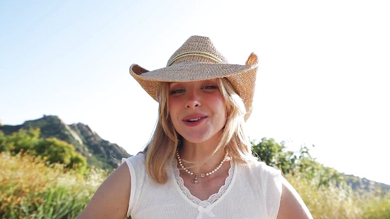 Caroline Zalog Trying on Cowgirl Outfit