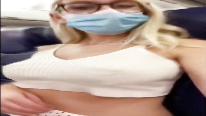 Blonde Masturbating on a Plane Publicly