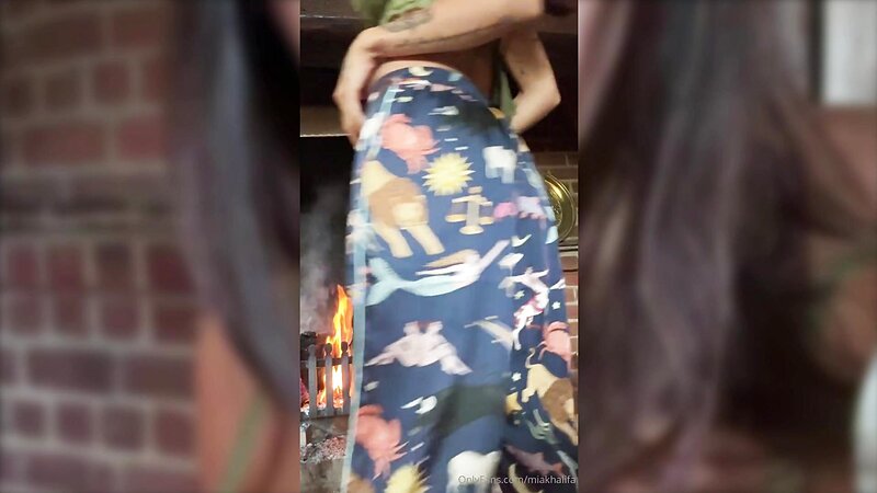 Mia Khalifa Hot Fireplace Striptease