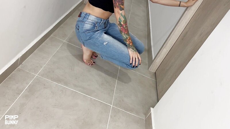 Minami Wetting Herself in Jeans with Tattoos and Black Nails Teasing in Closed Bathroom